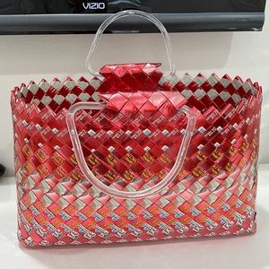 Handmade hand woven bubble gum wrapper tote with lucite handles.